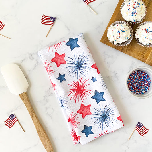 https://www.simplylaurenathome.com/cdn/shop/products/decorative-hand-towel-4th-of-july-stars-and-fireworks.jpg?v=1681321793&width=533